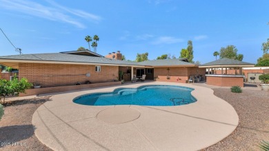 Discover this meticulously 4 bed, 3.5 bath custom home on a on Mesa Country Club in Arizona - for sale on GolfHomes.com, golf home, golf lot