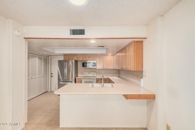 Located in the adult community, Ahwatukee, that is convenient to on Ahwatukee Country Club in Arizona - for sale on GolfHomes.com, golf home, golf lot