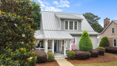 Welcome to this charming 3-bedroom, 3.5-bathroom Landing cottage on Reynolds Lake Oconee - The Landing in Georgia - for sale on GolfHomes.com, golf home, golf lot