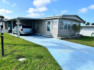 Welcome to this charming and inviting1967 double-wide home, With on Heather Hills Golf Course in Florida - for sale on GolfHomes.com, golf home, golf lot
