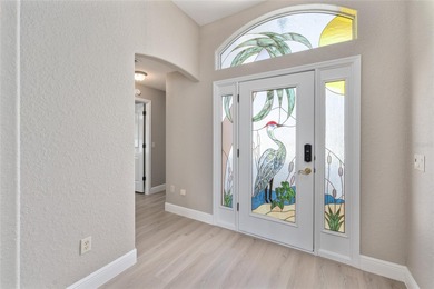 ONE OF A KIND IN SUNSET POINTE! Located on HERON GOLF COURSE on Glenview Championship Golf and Country Club in Florida - for sale on GolfHomes.com, golf home, golf lot