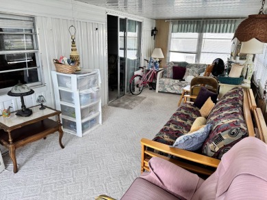 Welcome to this charming and inviting1967 double-wide home, With on Heather Hills Golf Course in Florida - for sale on GolfHomes.com, golf home, golf lot