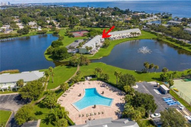 Lakefront Retreat in an Amenity-Rich Community - Waterside at on St. Petersburg Country Club in Florida - for sale on GolfHomes.com, golf home, golf lot