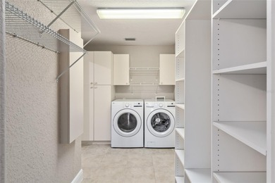 REDUCED by over $50,000. ONE OF A KIND IN SUNSET POINTE! Located on Glenview Championship Golf and Country Club in Florida - for sale on GolfHomes.com, golf home, golf lot