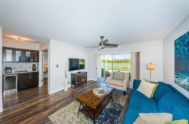 Come check out this desirable first floor furnished designer on Isla Del Sol Yacht and Country Club in Florida - for sale on GolfHomes.com, golf home, golf lot