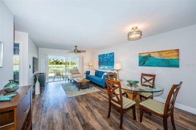 Come check out this desirable first floor furnished designer on Isla Del Sol Yacht and Country Club in Florida - for sale on GolfHomes.com, golf home, golf lot