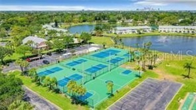 Lakefront Retreat in an Amenity-Rich Community - Waterside at on St. Petersburg Country Club in Florida - for sale on GolfHomes.com, golf home, golf lot