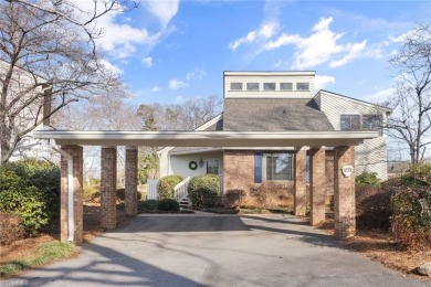 Discover this lovely home overlooking the 9th hole at BRCC. This on Bermuda Run Country Club in North Carolina - for sale on GolfHomes.com, golf home, golf lot