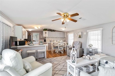 Step into a world of sun-drenched sophistication and carefree on Twin Isles Country Club in Florida - for sale on GolfHomes.com, golf home, golf lot