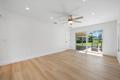 Enjoy life in a completely renovated home with stunning water on Eastpointe Country Club in Florida - for sale on GolfHomes.com, golf home, golf lot