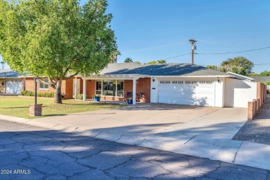 BELOW MARKET PRICE! This stunning 1,801 sf red brick home with a on Palo Verde Golf Course in Arizona - for sale on GolfHomes.com, golf home, golf lot