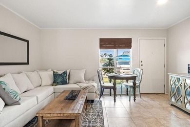 Adorable ground floor unit at Mustang Isle Condominiums. This on Palmilla Beach Golf Club in Texas - for sale on GolfHomes.com, golf home, golf lot