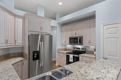 Beautiful 3BD/2BA townhome overlooking the 5th hole at Laurel on Laurel Ridge Country Club in North Carolina - for sale on GolfHomes.com, golf home, golf lot