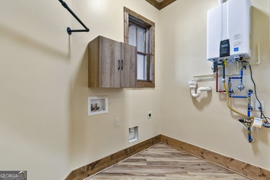 Escape to the mountains with this almost new, custom-built ranch on Bent Tree Golf Course in Georgia - for sale on GolfHomes.com, golf home, golf lot