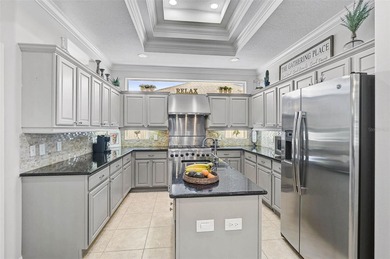 What if you could find a beautiful home that rivals a model home on Links At Greenfield Plantation in Florida - for sale on GolfHomes.com, golf home, golf lot