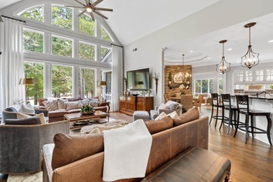 This stunning custom home overlooks the 8th fairway and green of on Reynolds Lake Oconee - The Oconee in Georgia - for sale on GolfHomes.com, golf home, golf lot