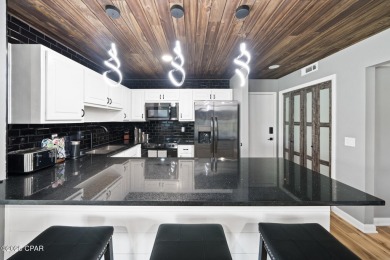 Step into this stunning condo, perfectly situated on the golf on Bay Point Resort Golf Club in Florida - for sale on GolfHomes.com, golf home, golf lot