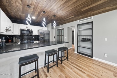 Step into this stunning condo, perfectly situated on the golf on Bay Point Resort Golf Club in Florida - for sale on GolfHomes.com, golf home, golf lot