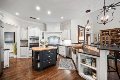 This stunning custom home overlooks the 8th fairway and green of on Reynolds Lake Oconee - The Oconee in Georgia - for sale on GolfHomes.com, golf home, golf lot