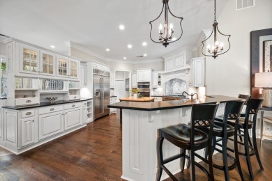 This stunning custom home overlooks the 8th fairway and green of on Reynolds Lake Oconee - The Oconee in Georgia - for sale on GolfHomes.com, golf home, golf lot