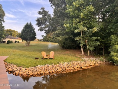 Want to be on the water with a dock right in your back yard but on Rarity Bay Country Club - Loudon in Tennessee - for sale on GolfHomes.com, golf home, golf lot