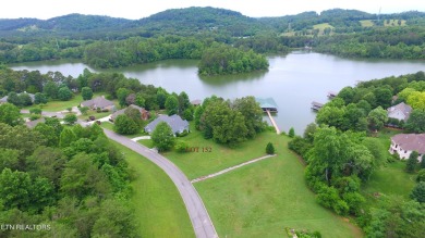 Want to be on the water with a dock right in your back yard but on Rarity Bay Country Club - Loudon in Tennessee - for sale on GolfHomes.com, golf home, golf lot