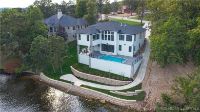 Modern elegance in Nichols Point Estates in the heart of Osage on The Oaks Golf Course in Missouri - for sale on GolfHomes.com, golf home, golf lot