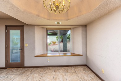 This perfectly maintained home is located just minutes from on London Bridge Golf Course in Arizona - for sale on GolfHomes.com, golf home, golf lot