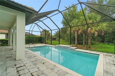 HEATED SALTWATER POOL WITH WATERFALL - EXPANDED LANAI - GOLF on River Hall Country Club in Florida - for sale on GolfHomes.com, golf home, golf lot
