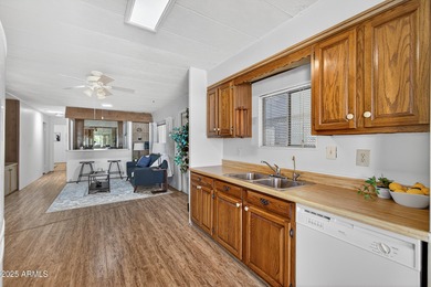 Start your mornings with coffee on the patio, surrounded by on Apache Wells Country Club in Arizona - for sale on GolfHomes.com, golf home, golf lot