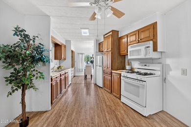 Start your mornings with coffee on the patio, surrounded by on Apache Wells Country Club in Arizona - for sale on GolfHomes.com, golf home, golf lot