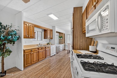 Start your mornings with coffee on the patio, surrounded by on Apache Wells Country Club in Arizona - for sale on GolfHomes.com, golf home, golf lot