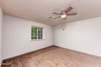 This perfectly maintained home is located just minutes from on London Bridge Golf Course in Arizona - for sale on GolfHomes.com, golf home, golf lot