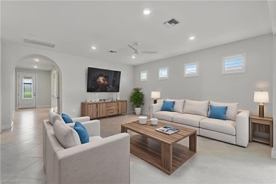 HEATED SALTWATER POOL WITH WATERFALL - EXPANDED LANAI - GOLF on River Hall Country Club in Florida - for sale on GolfHomes.com, golf home, golf lot