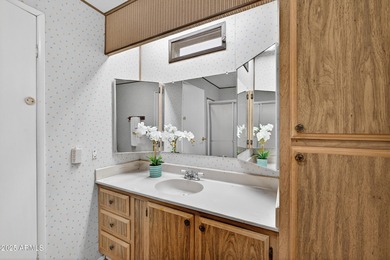 INVESTOR OPPORTUNITY with TENANT IN PLACE, offering immediate on Apache Wells Country Club in Arizona - for sale on GolfHomes.com, golf home, golf lot