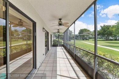 Updated 2/2 on the 1st floor in Hidden Woods! Great green space on Deer Creek Golf Club in Florida - for sale on GolfHomes.com, golf home, golf lot