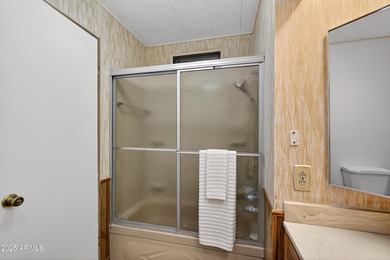 INVESTOR OPPORTUNITY with TENANT IN PLACE, offering immediate on Apache Wells Country Club in Arizona - for sale on GolfHomes.com, golf home, golf lot