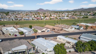 INVESTOR OPPORTUNITY with TENANT IN PLACE, offering immediate on Apache Wells Country Club in Arizona - for sale on GolfHomes.com, golf home, golf lot