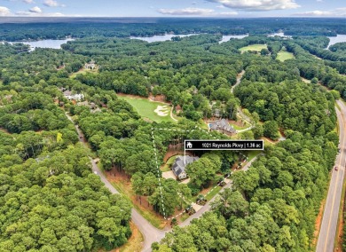 ELEGANT DREAMBUILT ESTATE ON A PREMIER DOUBLE LOT OVERLOOKING on Reynolds Lake Oconee - The Oconee in Georgia - for sale on GolfHomes.com, golf home, golf lot