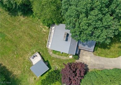 Looking for a change in lifestyle? Welcome to 39 Pueblo Trail on Lake Mohawk Golf Club in Ohio - for sale on GolfHomes.com, golf home, golf lot