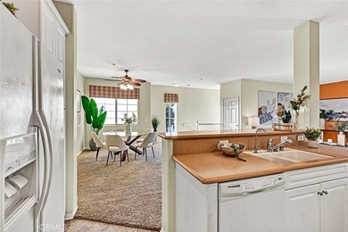 Welcome to a home designed for effortless living. Nestled within on Mile Square Golf Course in California - for sale on GolfHomes.com, golf home, golf lot