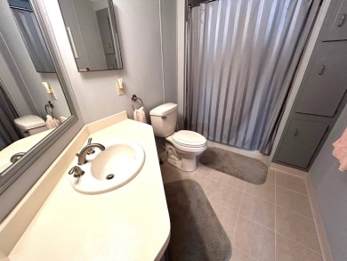 This bright home has been lovingly remodeled bringing modern on Crystal Lake Club in Florida - for sale on GolfHomes.com, golf home, golf lot