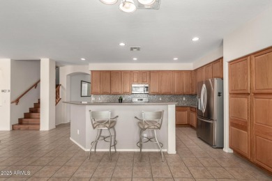 Amazing 2-level residence in the very popular Augusta Ranch on Augusta Ranch Golf Club in Arizona - for sale on GolfHomes.com, golf home, golf lot