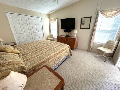 This bright home has been lovingly remodeled bringing modern on Crystal Lake Club in Florida - for sale on GolfHomes.com, golf home, golf lot