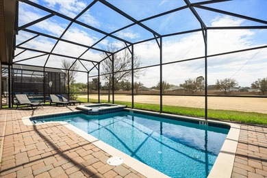 TURNKEY VACATION HOME! Located in the attractive Champions Gate on The Oasis Club at Champions Gate in Florida - for sale on GolfHomes.com, golf home, golf lot