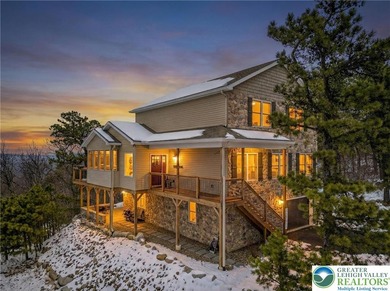 Experience elevated mountain living in this refined 4-bedroom on Eagle Rock Golf and Ski Resort in Pennsylvania - for sale on GolfHomes.com, golf home, golf lot