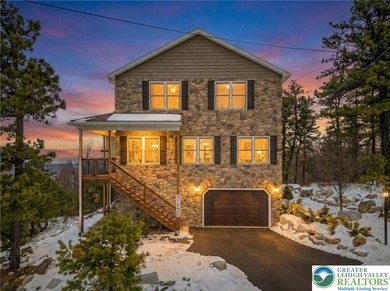 Experience elevated mountain living in this refined 4-bedroom on Eagle Rock Golf and Ski Resort in Pennsylvania - for sale on GolfHomes.com, golf home, golf lot