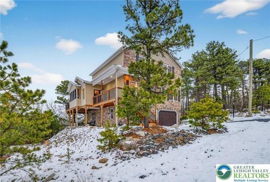 Experience elevated mountain living in this refined 4-bedroom on Eagle Rock Golf and Ski Resort in Pennsylvania - for sale on GolfHomes.com, golf home, golf lot