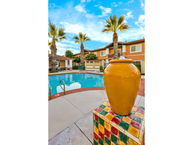 Welcome to a home designed for effortless living. Nestled within on Mile Square Golf Course in California - for sale on GolfHomes.com, golf home, golf lot