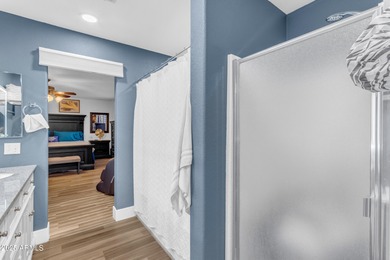 Welcome to this beautifully updated 4-bedroom, 2.5-bath home on The Golf Club At Johnson Ranch in Arizona - for sale on GolfHomes.com, golf home, golf lot
